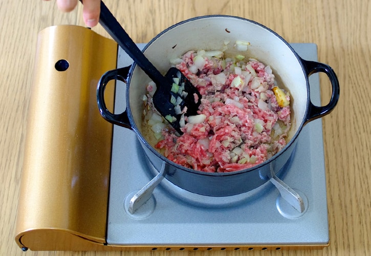 炒める